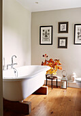 Freestanding bath with Autumn leaves in Bicester home Oxfordshire England