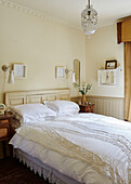 Lace bed covers on double bed in Whitley Bay bedroom Tyne and Wear England UK