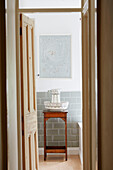 Jug and bowl on wooden washstand in Birmingham home England UK