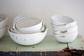 Collection of white bowls on shelf in Country Durham kitchen, North East England