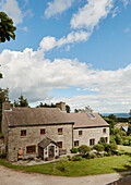 Tiled roof and porch of Herefordshire farmhouse, England, UK