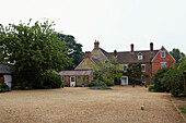 Wide gravel driveway to detached Syresham home, Northamptonshire, UK