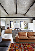 Open plan living room with kitchen in Sligo home, Ireland