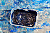 Blue paint on dustcloth in Sligo studio Ireland