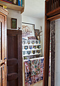 Architectural salvage and vintage ornaments in recess of Somerset home, UK