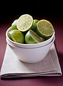 White bowl with cut limes