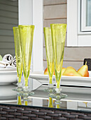 Green glassware on a garden table
