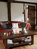 Coffee table and sofa in timber framed cottage Herefordshire, England, UK