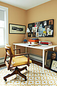 Pinboard above desk with wooden chair in Berkshires home, Massachusetts, Connecticut, USA