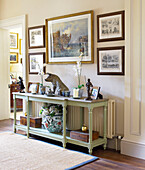 Homeware ornaments and artwork with console table in Lincolnshire country house, England, UK