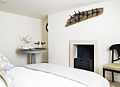 Bird sculptures and art installation in bedroom of contemporary Bath home Somerset, England, UK