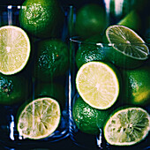 Glass storage containers full of limes