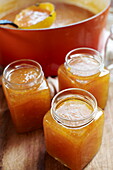 Marmalade setting in jars, Southend-on-sea, Essex, England, UK