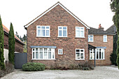 Brick exterior of detached Farnham home Surrey England UK