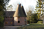 Modernised brick building set in own grounds, Kent, England, UK