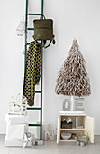 Wintery twig tree with ladder and Christmas decorations