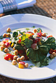 Plated salad with chickpeas
