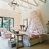 Feminine bedroom with floral drapes