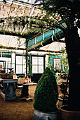 Restaurant and cafe in large greenhouse with botanical displays