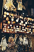 handmade souvenirs in a market stall in the medina Fez Morocco