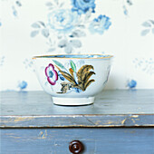 Ornate pottery on cupboard