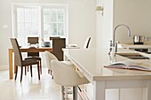 Open plan dining room and kitchen in contemporary home