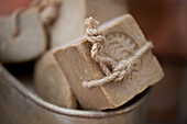 Artisan soaps in vintage hand-beaten bowl Edwardian West Sussex townhouse England UK