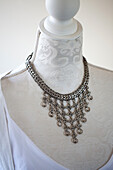 Indian silver necklace on mannequin in West Sussex home England UK