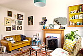 Vintage leather two seater sofa in living room of Birmingham home