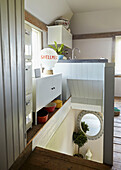 Open plan staircase kitchen in UK farmhouse