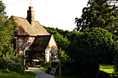 Footpath to detached Brabourne farmhouse,  Kent,  UK