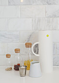 Coffee pot and storage jars in kitchen detail of London home  UK