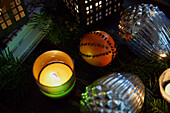 Tealight with clove orange and silver baubles in Rochester home  Kent  UK