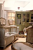 Shop interior of French Provencal furniture with two fauteuils