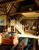 Barn sitting area looking towards dining area and kitchen