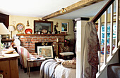 Suffolk cottage living room with exposed brick fireplace