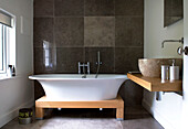 Modern bathroom with free standing bathtub