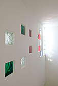 White wall with color glass bricks