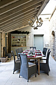 Dining table set for Christmas dinner in Wiltshire farmhouse