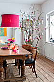 Christmas decorations in dining room of modern Odense family home Denmark