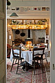 Table set for Christmas dinner in farmhouse, Cornwall, England, UK