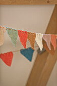 Handmade bunting and ceiling detail in Blagdon home, Somerset, England, UK