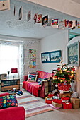 Greetings cards and Christmas tree in Penzance home Cornwall England UK