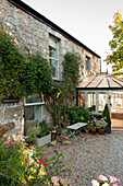 Anbau eines Wintergartens an ein freistehendes Steinhaus in Penzance, Cornwall, UK