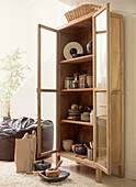 Wooden and glass storage cupboard in dining room