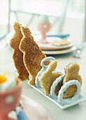 Easter breakfast with rabbit shaped toast in a toast rack