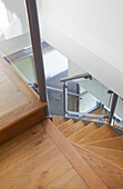 Grey metal handrails on wooden staircase in Rolvenden water tower conversion Cranbrook Kent England UK