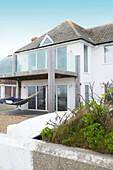 Hammock on terrace of detached Hayling Island beach house Hampshire English UK