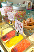 Confectionary and ice cream with hand-made signs in Brighton Sussex England UK