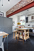 Zinc topped kitchen trolley with Kings Road sign and exposed brick Southsea UK